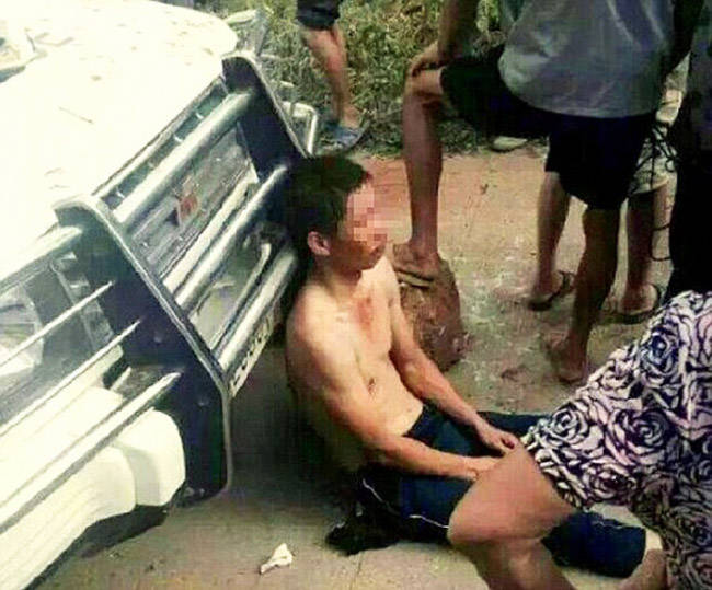 hombre chino paliza pueblo por matar perros yulin
