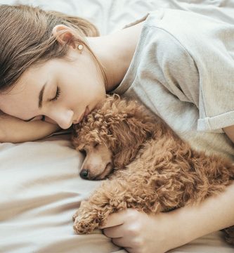 dormir con tu perro