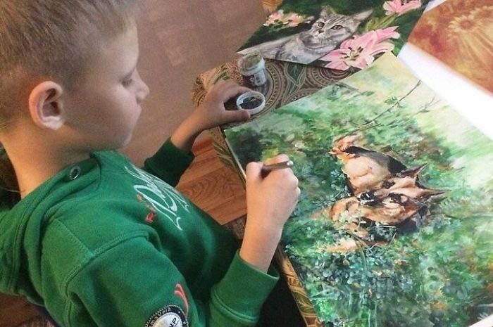 niño pintor refugio animales abandonados